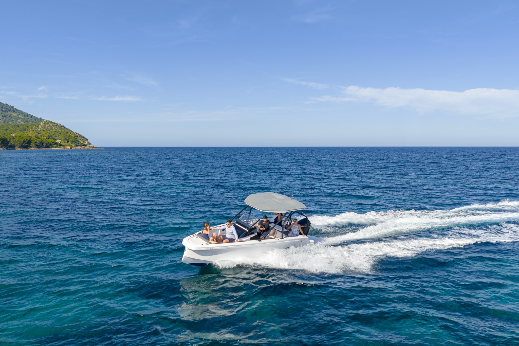 Axopar 22 with guests at sea